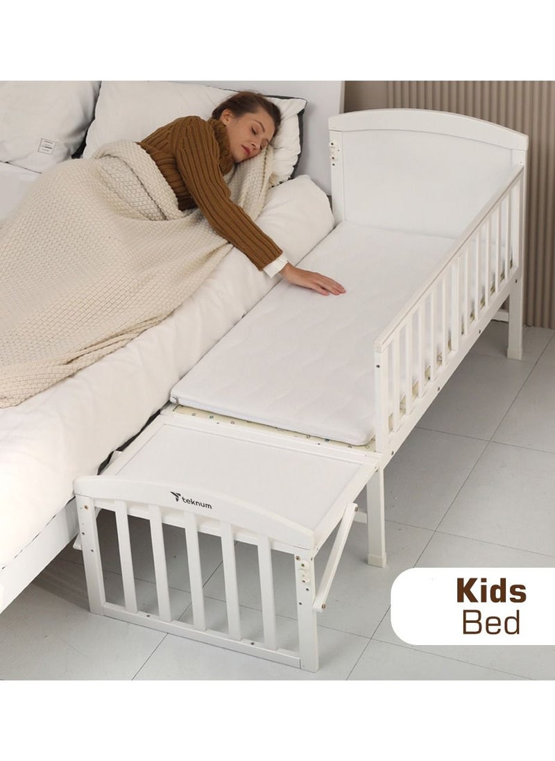 TEKNUM - 7-In-1 Convertible Bedside Crib With Mattress, Mosquito Net And Detachable Wheels, 0 - 12 Years, White - Image 1