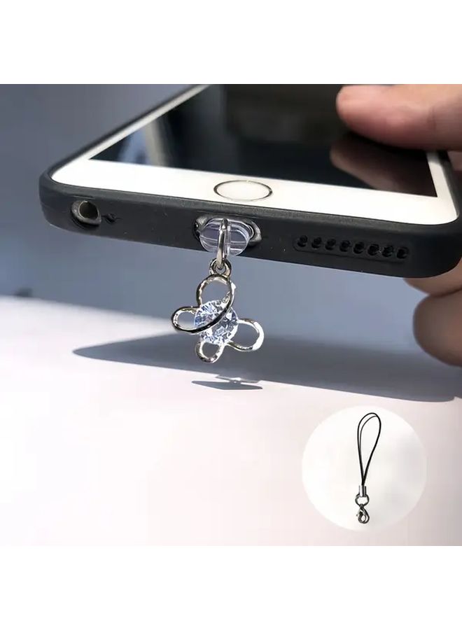 سدادة غبار للهاتف على شكل فراشة مع حجر الزركونيا اللامع وسلسلة تعليق، مناسبة لأجهزة iPhone 6 إلى 14 Pro Max - Image 1