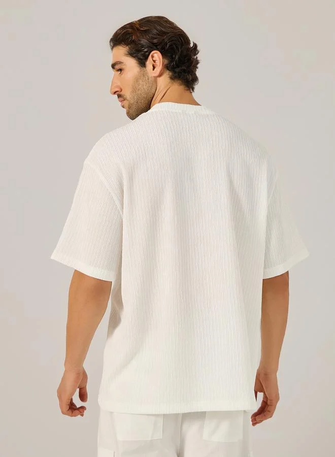 Styli Textured Oversized T-Shirt with Minimal Embroidery