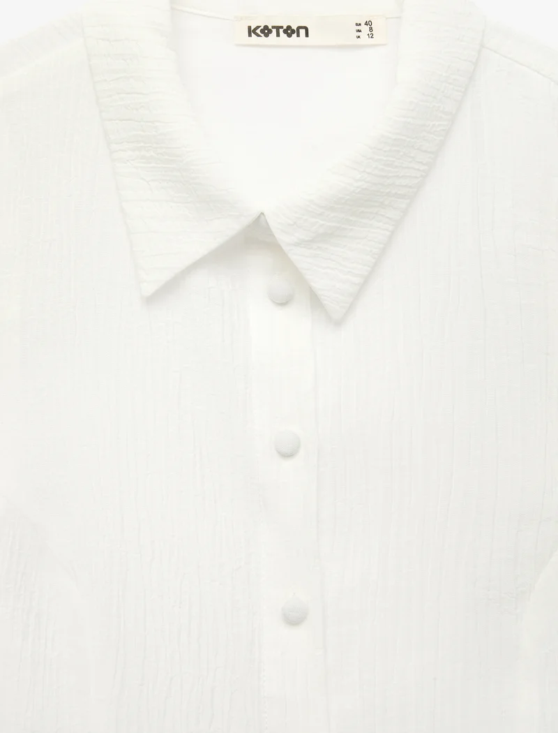 Koton  Peplum Sleeveless Shirt for Women | Best Price UAE
