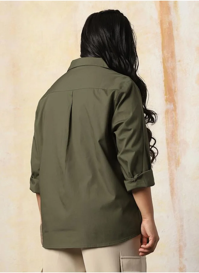 HIGH STAR Women Shirts in Olive featuring Oversized fit with a solid pattern, spread collar collar, shirt collar neckline, regular sleeves, secured with button closure, crafted from 100% cotton – ideal for both casual and formal outings.