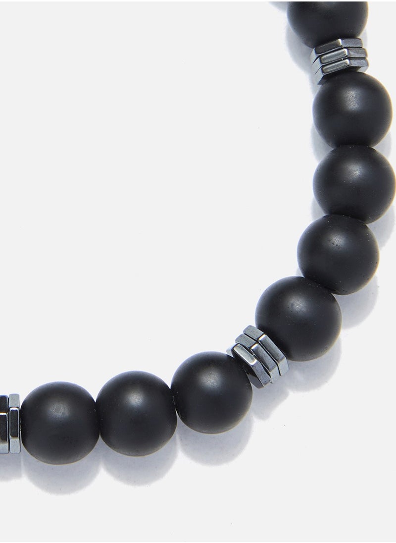 CHRYSOSTOMOS - Handmade Beaded Bracelet with Matte Black Onyx and Triple Flat Hematite Nut, Silicone Elastic - Image 1