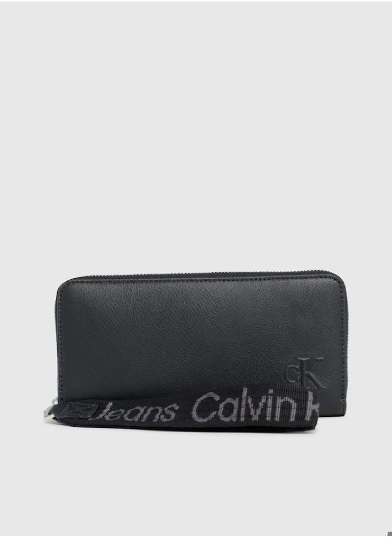 Calvin Klein Jeans Women's RFID Wristlet Zip Around Wallet -  recycled faux leather, Black