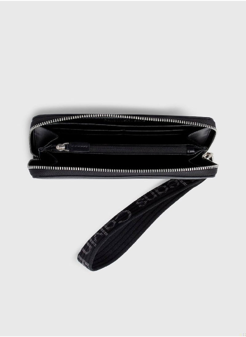 Calvin Klein Jeans - Women's RFID Wristlet Zip Around Wallet -  recycled faux leather, Black - Image 1