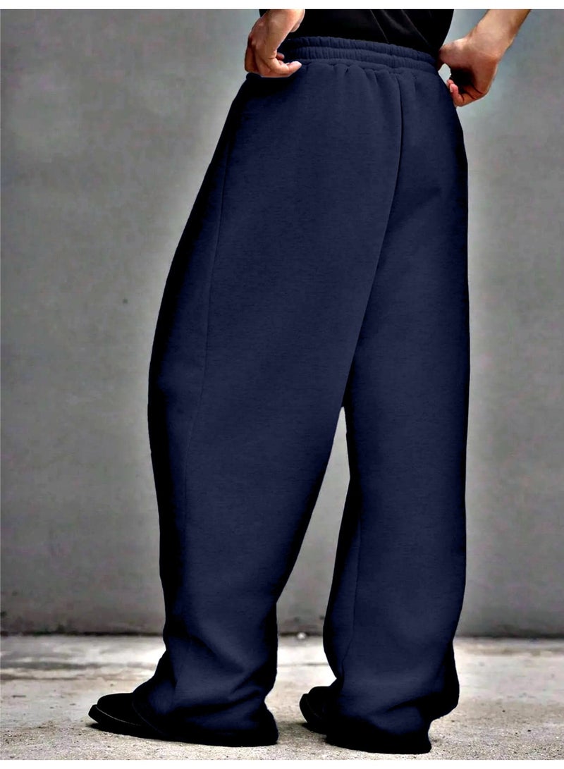 Elegant and modern men's sports pants in large sizes, color  blue. Loose and comfortable design with a drawstring, suitable for daily wear. - Image 2