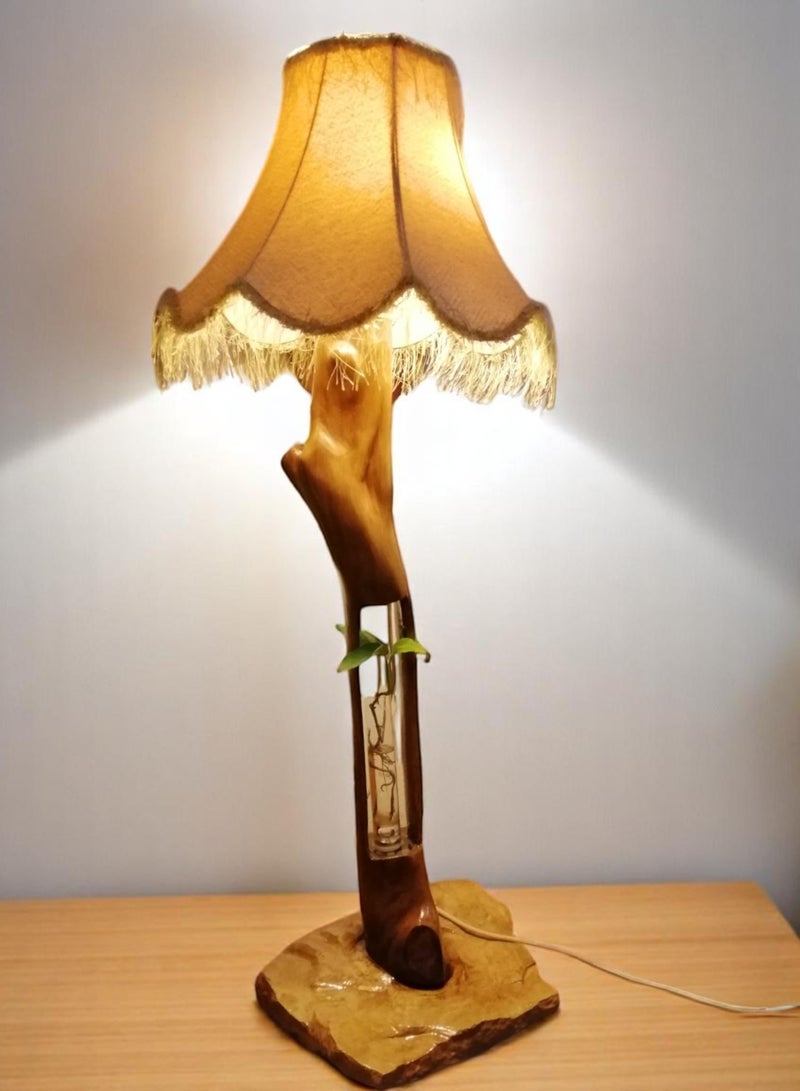 A lamp with a natural tree trunk carved in the middle to hold a glass vase mounted on a piece of natural stone coated with resin. - Image 2