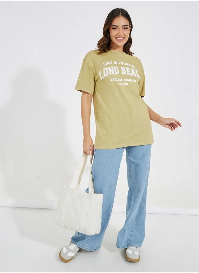 Styli Acid Wash Long Beach Slogan Oversized T-Shirt