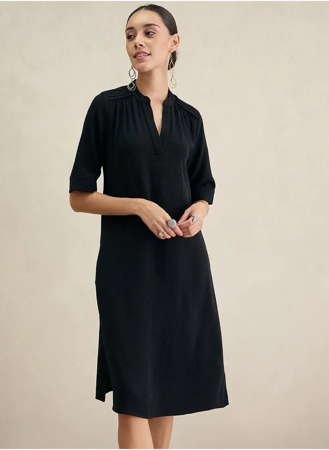 فيميلا Solid Notch Neck Midi Dress with Side Slit by Styli