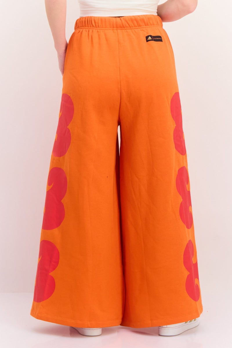 Adidas Women Loose Fit Marimekko Outdoor Pants, Orange - Image 2