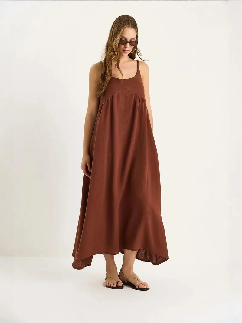 بيانكو لوتشي فستان ميدي موسلين لوكسي بنقوش وجيب