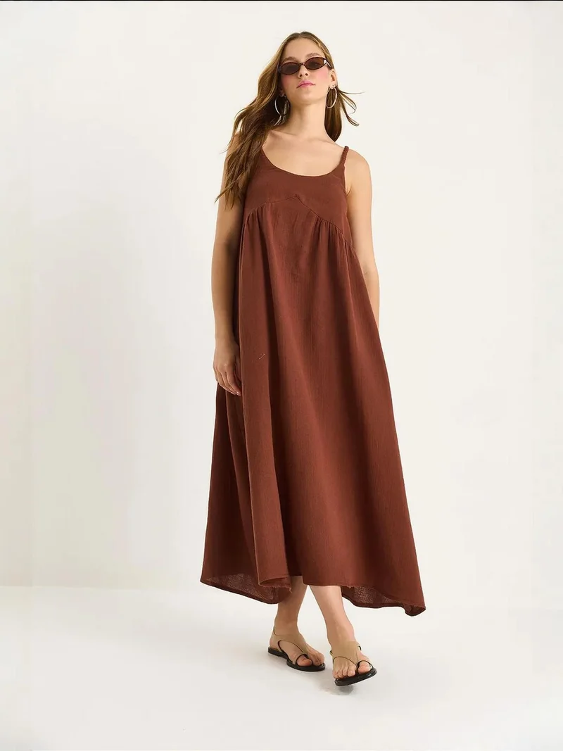 بيانكو لوتشي فستان ميدي موسلين لوكسي بنقوش وجيب