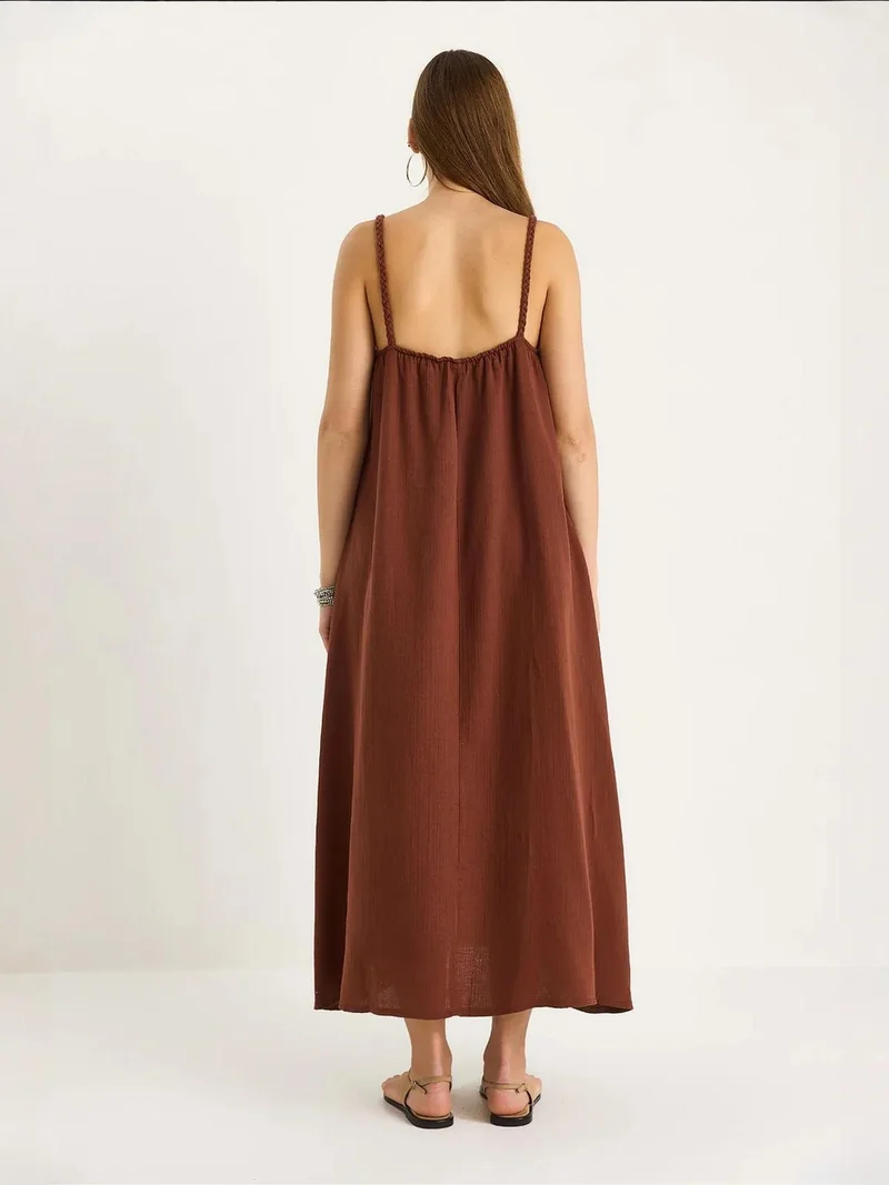 بيانكو لوتشي فستان ميدي موسلين لوكسي بنقوش وجيب