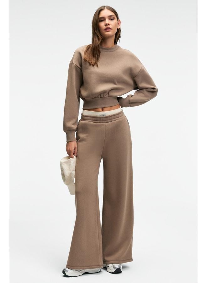 GRIMELANGE ENAVIE Women's Oversized Waist Elastic Double Pocket Mauve Sweatpants. - Image 1