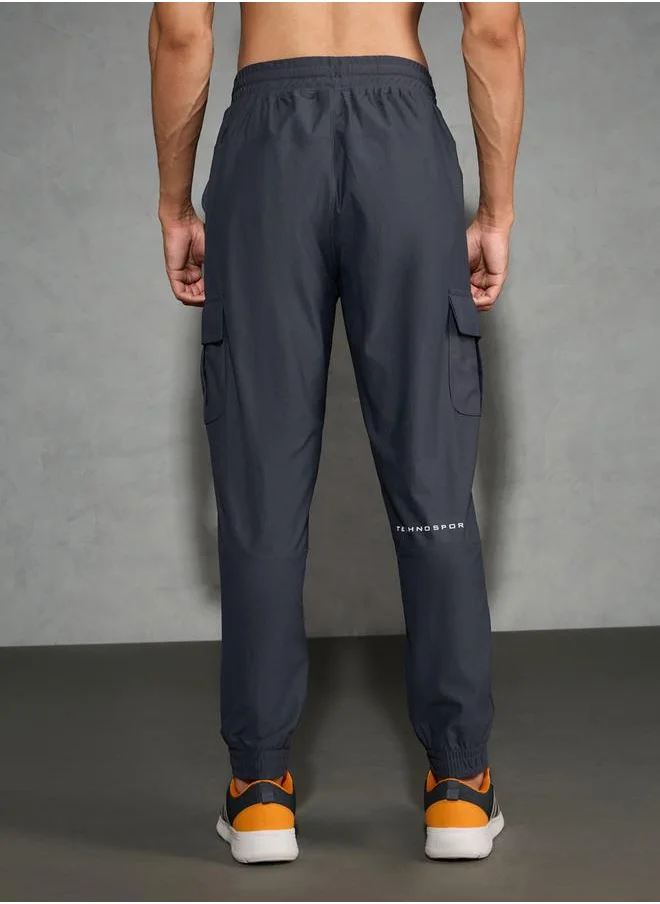 تكنوسبورت Technosport Solid Regular Fit Cargo Joggers with Drawstring