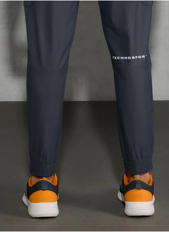تكنوسبورت Technosport Solid Regular Fit Cargo Joggers with Drawstring