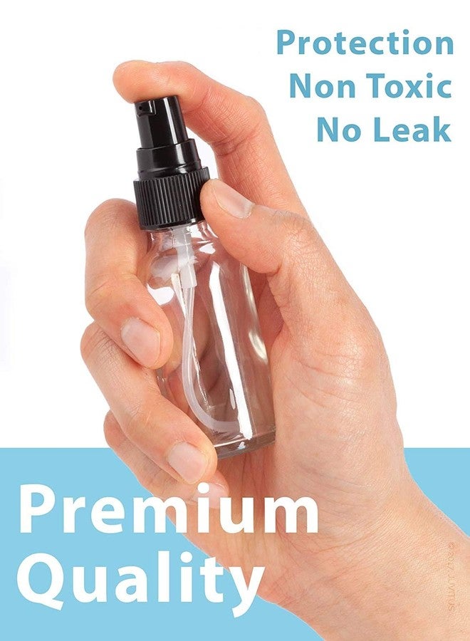 JUVITUS 1 oz / 30 ml Clear Glass Boston Round Bottle with Black Treatment Pump + Funnel (12 Pack) - Image 4
