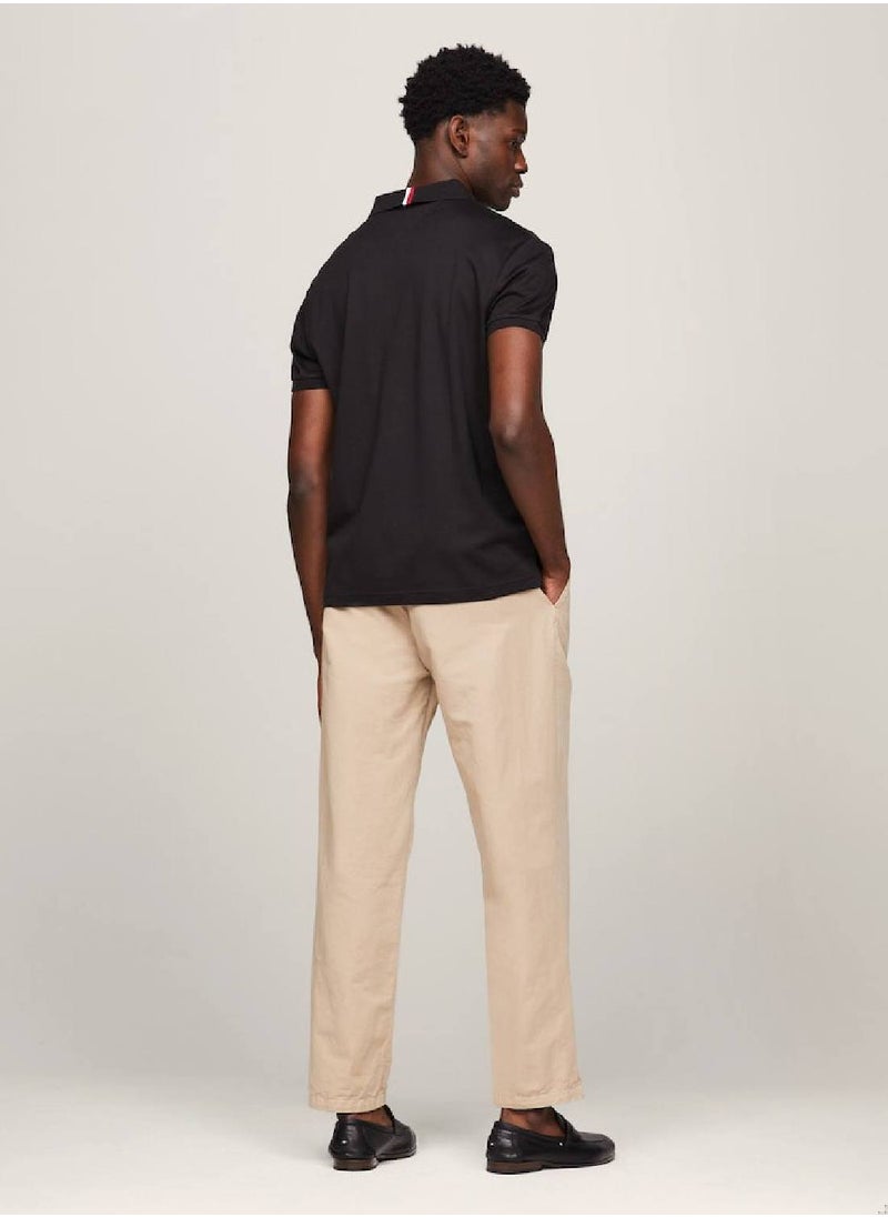 TOMMY HILFIGER - Men's Essential Regular Fit Flag Embroidery Polo -  Pure cotton, Black - Image 1