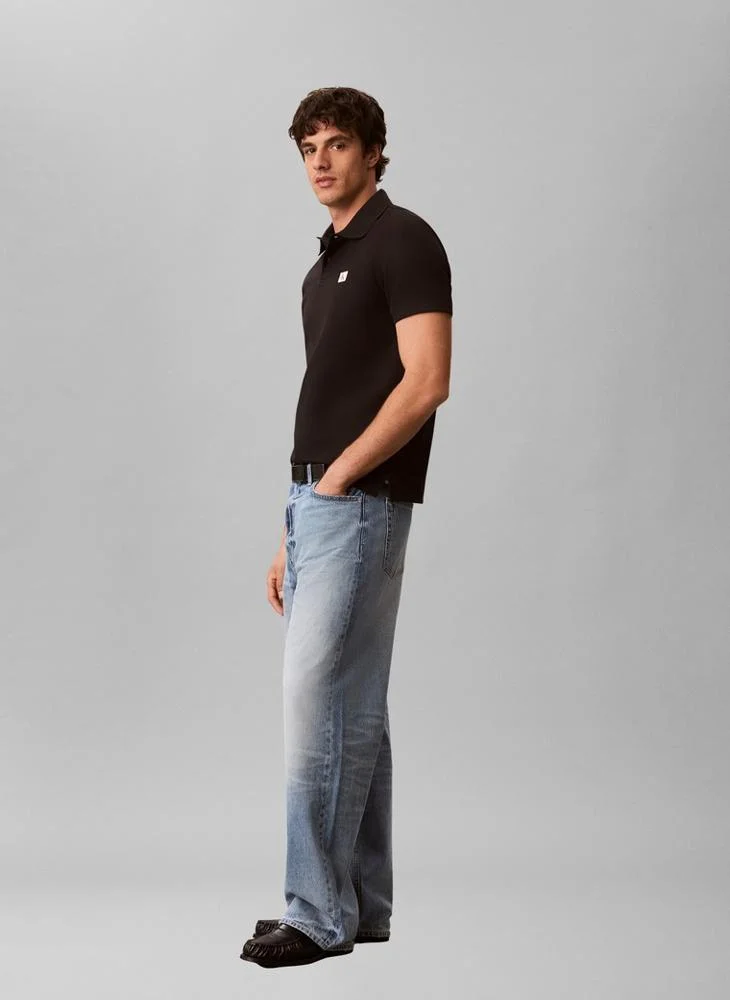 Calvin Klein Jeans Black Classic Fit Micro Waffle Knit Polo Shirt for Men | Best Price UAE