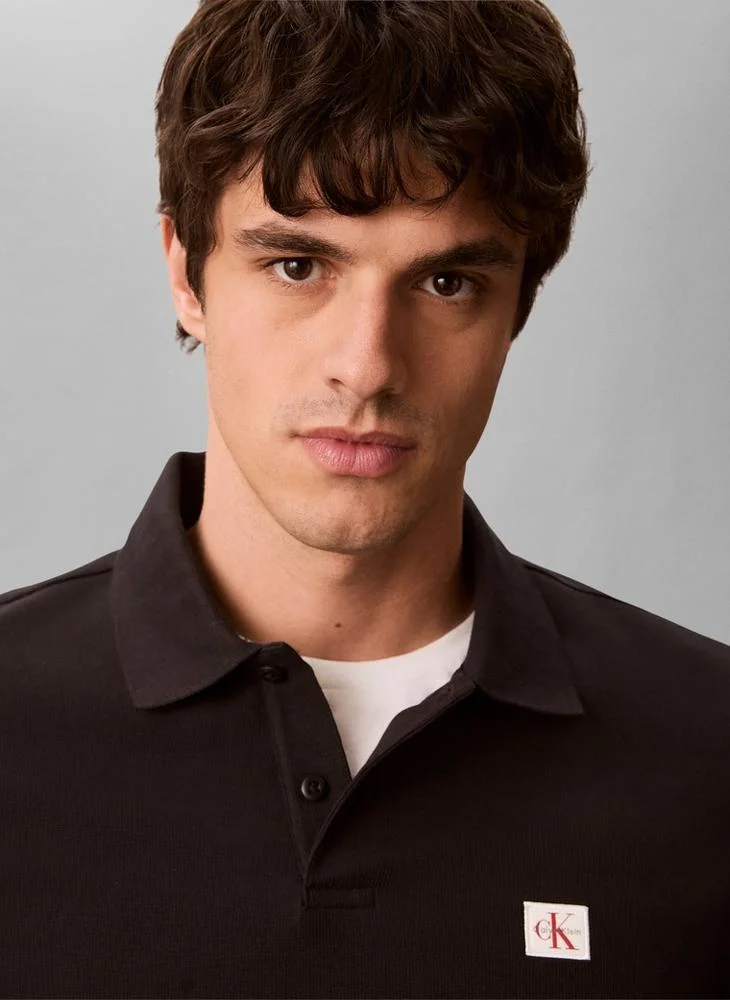 Calvin Klein Jeans Black Classic Fit Micro Waffle Knit Polo Shirt for Men | Best Price UAE