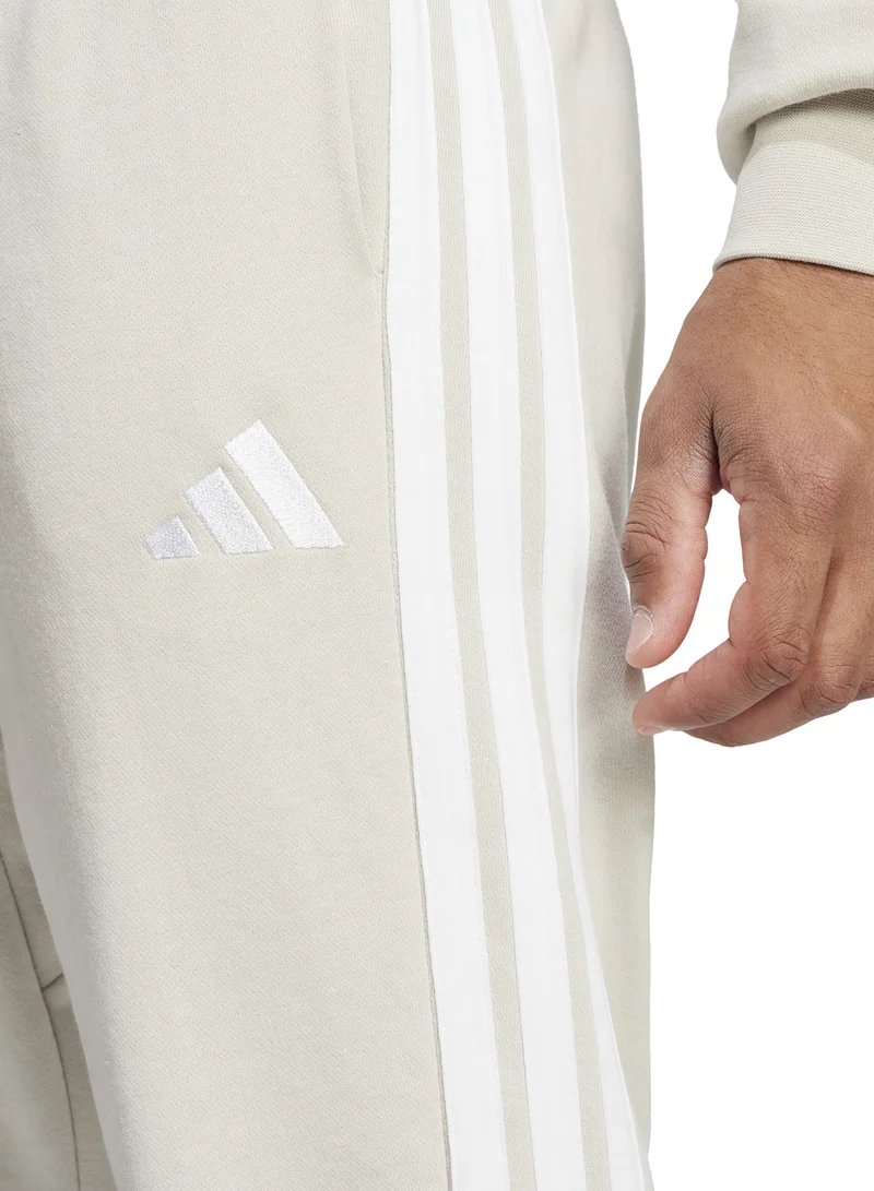 adidas سروال رياضي أساسي بثلاث خطوط من نسيج التيري الفرنسي