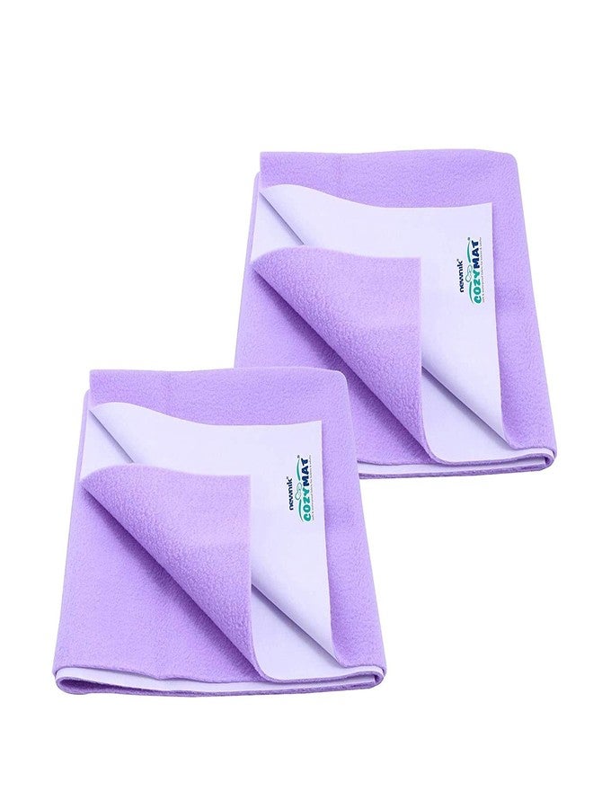 نيونيك كويك، ملاءات جافة مقاومة للماء متوسطة الحجم، عبوة من قطعتين، لون بنفسجي (مقاس كل قطعة: 70 سم × 100 سم) - Image 1