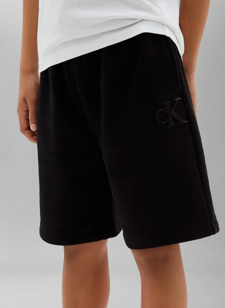 Calvin Klein Jeans Pvh Black Flock CK Monogram Sweat Shorts for Men | Best Price UAE