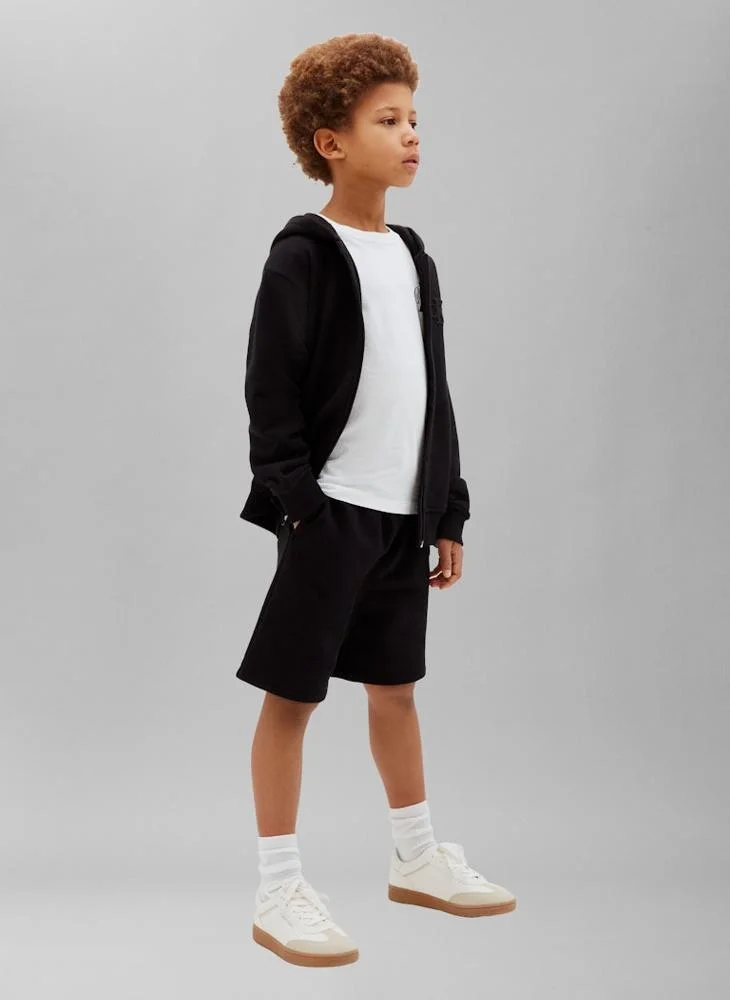 Calvin Klein Jeans Pvh Black Flock CK Monogram Sweat Shorts for Men | Best Price UAE