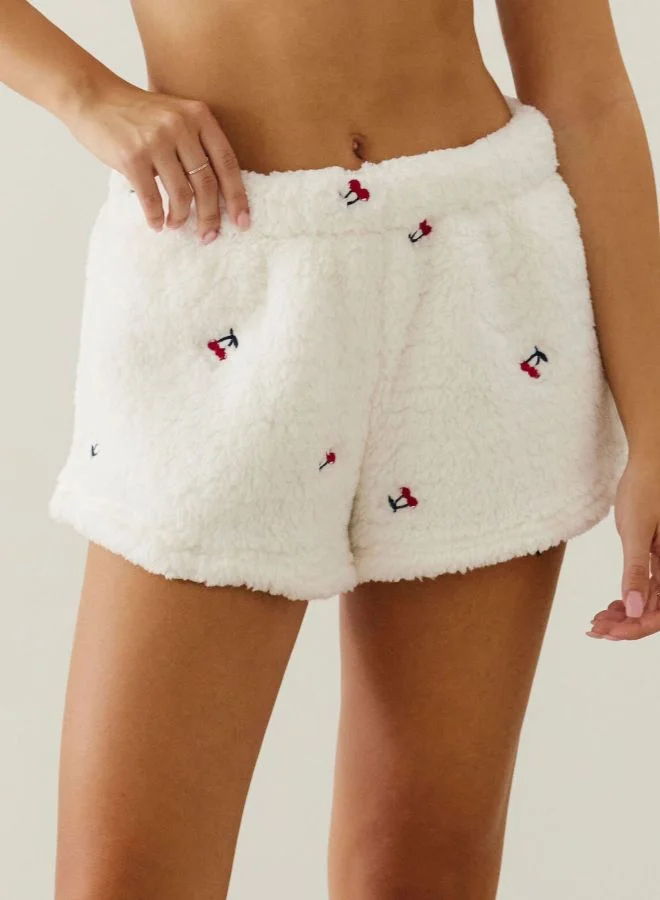 UNDIZ Sherpa shorts with cherry embroidery
