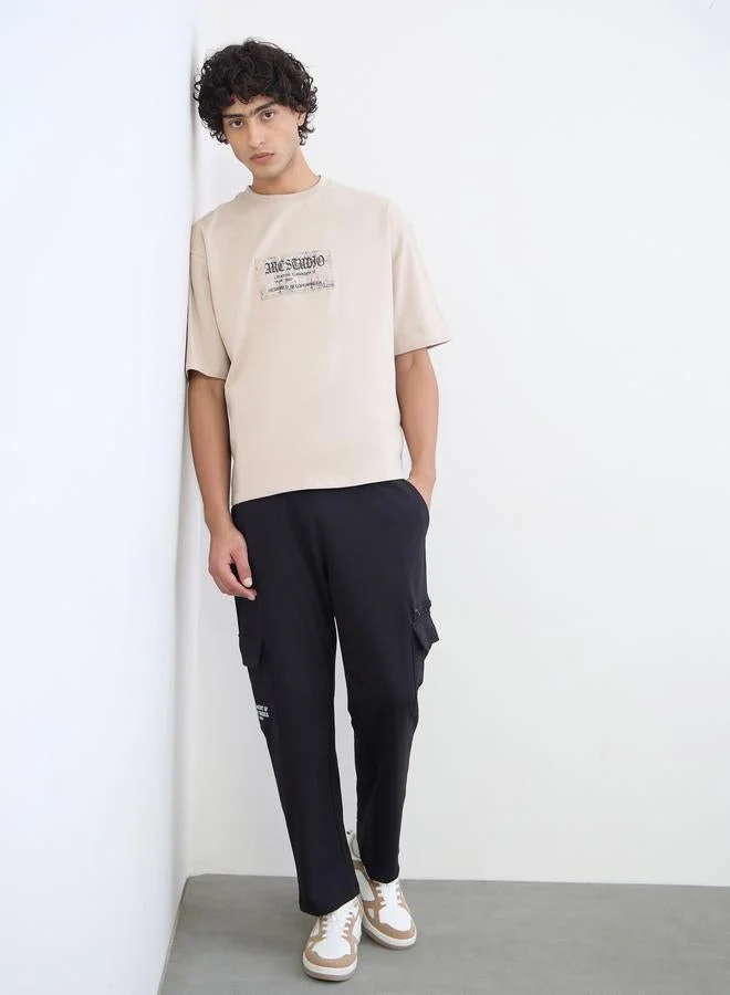 Styli Men Applique Detail Cotton Oversized T-Shirt