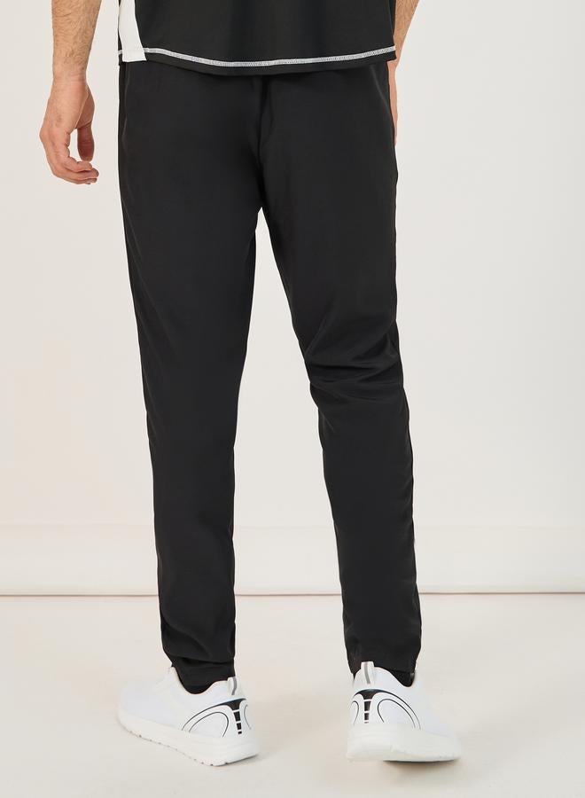 Styli 4-Way Stretch Compression Knit Slim Track Pants with Piping Detail  - Image 4