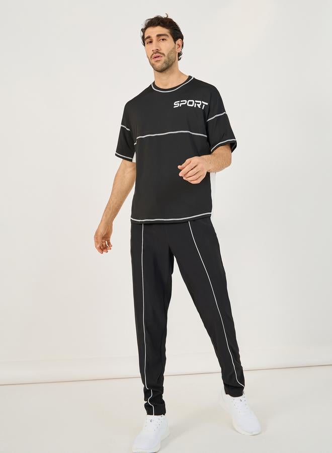 Styli 4-Way Stretch Compression Knit Slim Track Pants with Piping Detail  - Image 2