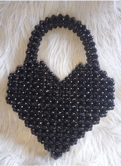 Handmade bag with a shiny black crystal heart, measuring 18 cm in length and 22 cm in width