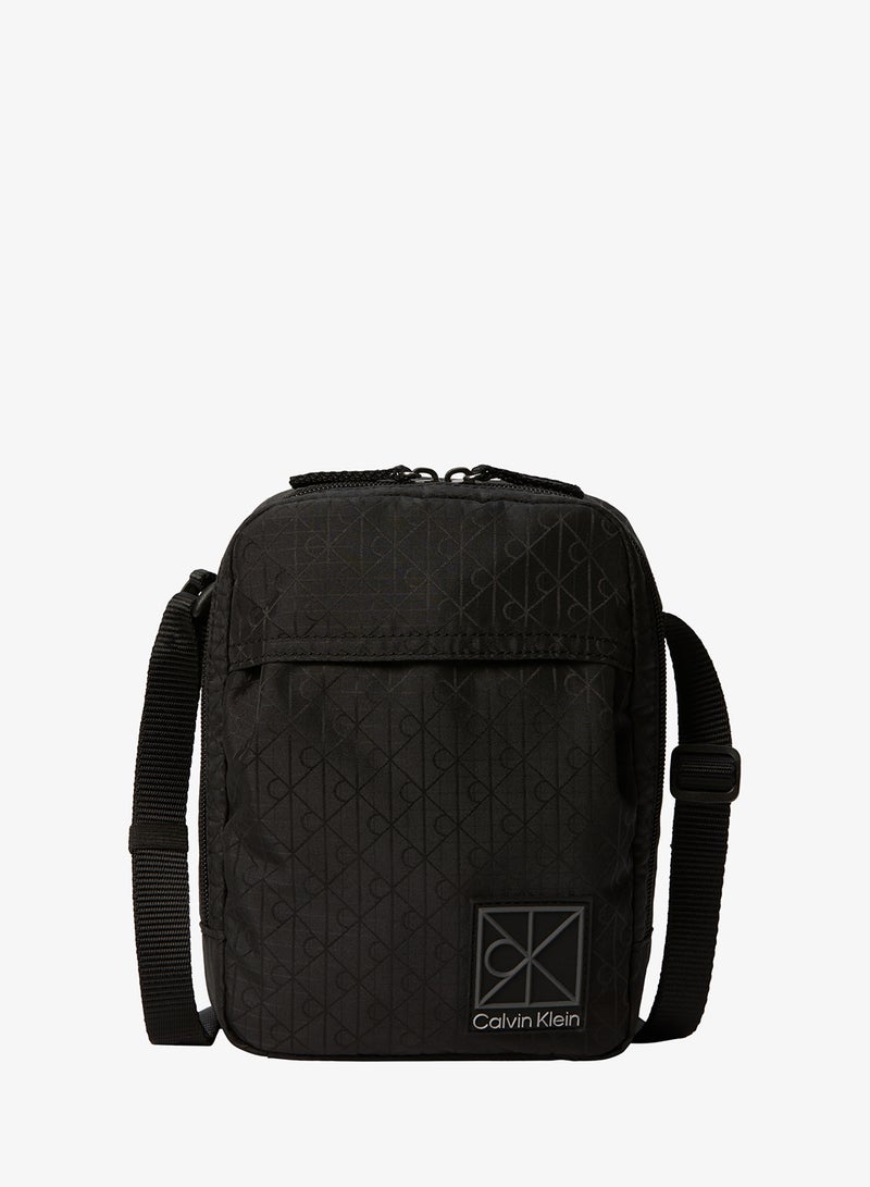 CALVIN KLEIN Textile Emblem Print Crossbody Reporter Bag - Image 1