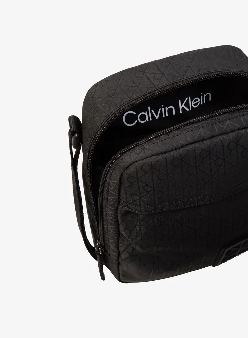 Calvin Klein Black Textile Emblem Print Crossbody Reporter Bag for Men | Best Price UAE