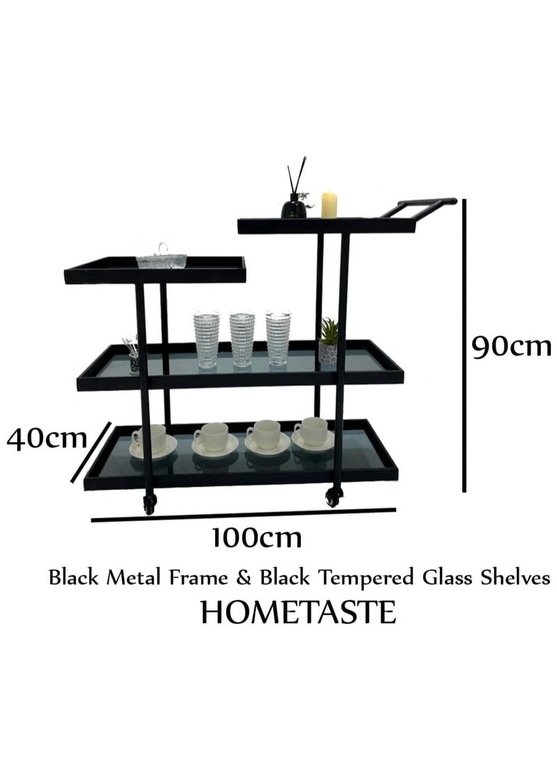 HOME TASTE - Modern Black Tempered Glass Serving Trolley 4 Tier Sturdy Metal Frame, Versatile Design, Ample Storage, Smooth Mobility, Secure Groove, Elegant Decor Piece Clear Glass Shelves, Big - Image 1