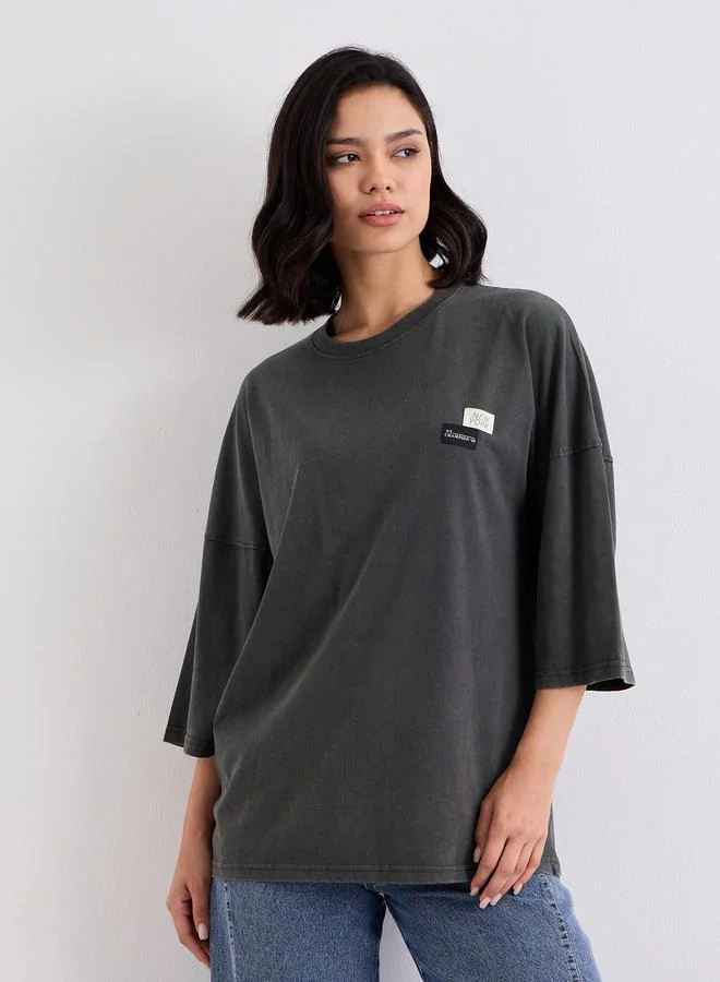 Styli Acid Wash Oversized T-Shirt with Badge Detail