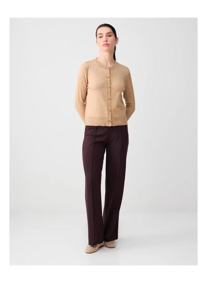 Jimmy Key Beige Round Neck Long Sleeve Button-Detailed Knit Cardigan.