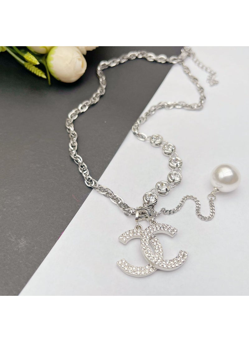 Generic - High-end sense letter titanium steel necklace female couple double-layer non-fading exquisite Joker Pearl sweater chain jewelry wholesale F032 double C tassel Pearl - Image 1