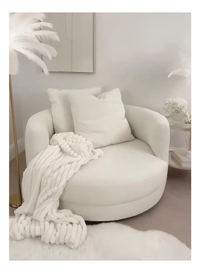 An elegant boucle chair that combines comfort and luxury
