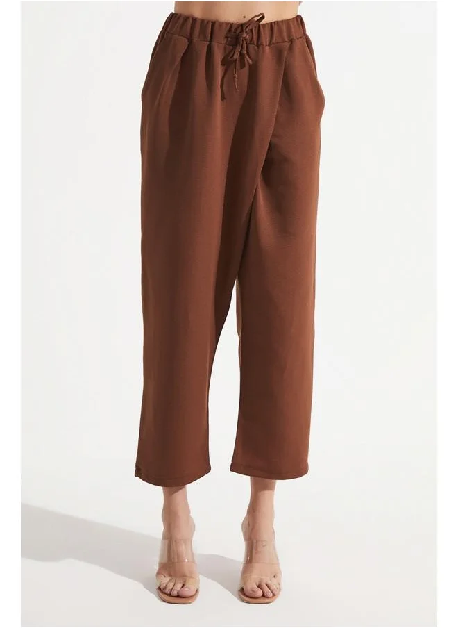 جون June Women Elastic Waist Cotton Blend Asymmetric Woven Trouser Brown