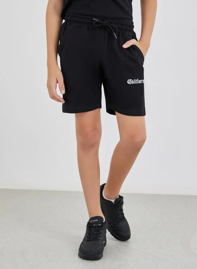 Styli Styli Slogan Print T-Shirt and Shorts Set