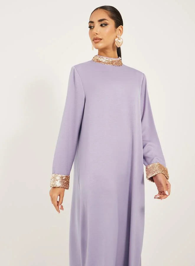 Styli high neck full sleeve jalabiya with shimmer trim