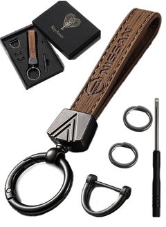 KeyAmor Elegant light brown metal and leather keychain with NISSAN logo featuring 3 key rings perfect as a fancy gift or car accessory designed in sleek light brown for a modern look offers 360 degree rotation for convenience suitable for both men and women and comes in a gift box.  - Image 1