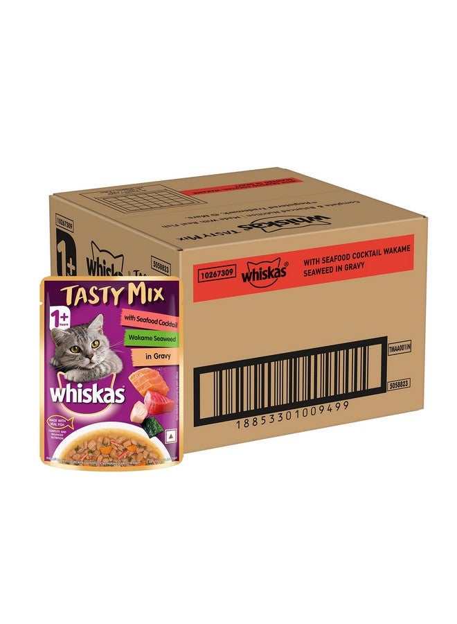 ويسكاس طعام القطط الرطب من ويسكاس تاستي ميكس للبالغين (1+ سنة)، كوكتيل مأكولات بحرية مع الأعشاب البحرية واكامي في المرق، 70 جرام، عبوة من 28 قطعة | مصنوع من الأسماك الحقيقية | تغذية كاملة ومتوازنة للقطط البالغة - Image 1