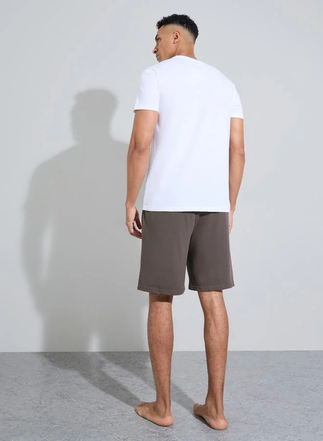 Styli  Multi-Color Slogan Print T-Shirt and Shorts Relaxed Fit Pyjama Set for Men | Best Price UAE