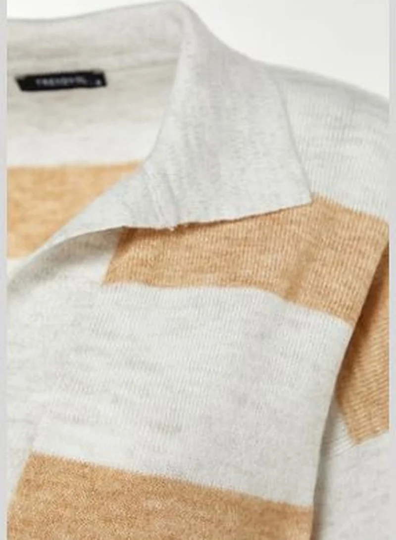 trendyol Wide fit in ecru. A Soft Textured Color Block Knitwear Sweater TWOAW23KZ00688.
