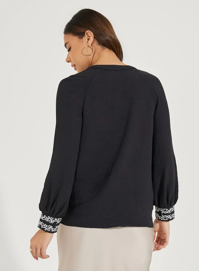 Styli Embroidered Hem Notch Neck Blouse with Cuffed Sleeves