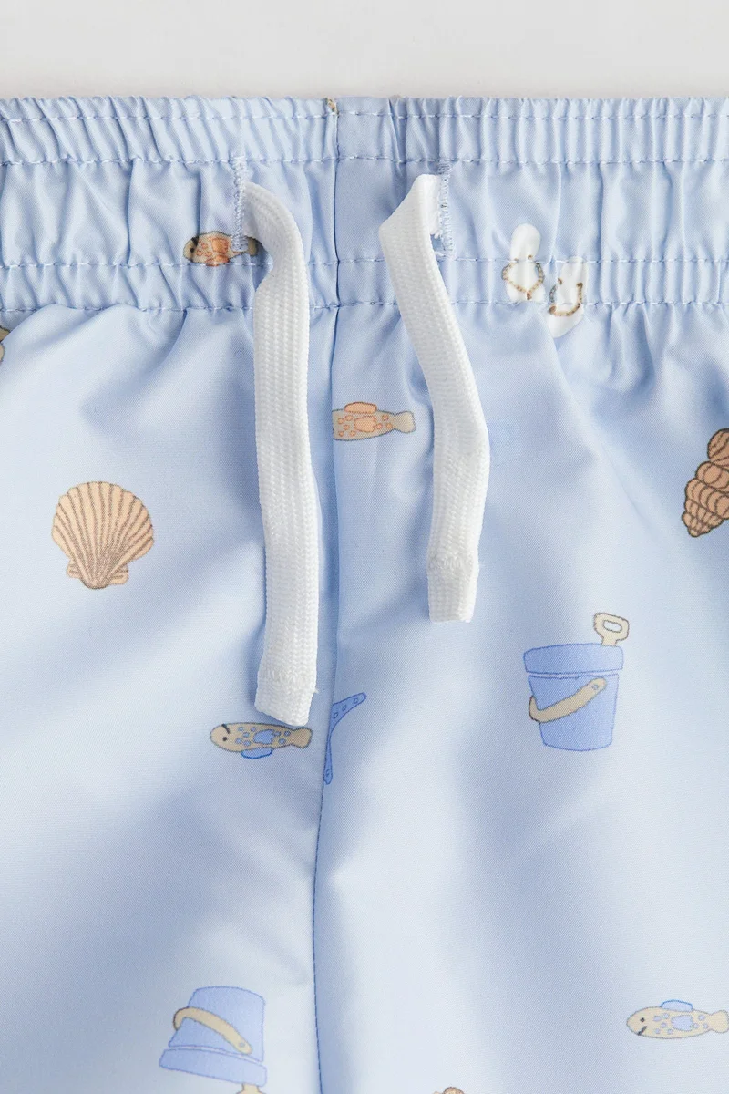 اتش اند ام شورت سباحة منقوش