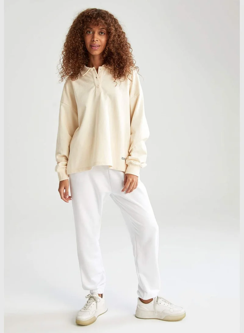 DeFacto V Yaka Slogan Baskılı Oversize Fit Sweatshirt