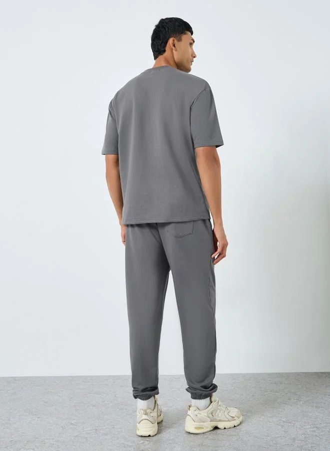 Styli  Men Short Sleeve Oversized T-Shirt and Joggers Co-Ords for Men | Best Price UAE